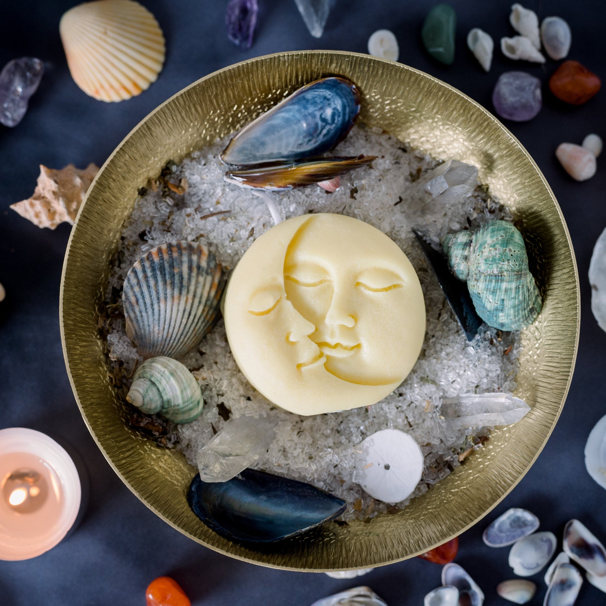 An altar with sea shells and candles